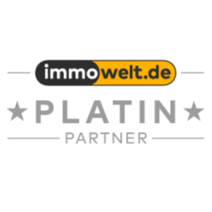 Das Logo zeigt „immowelt.de“ mit der Aufschrift „Platin Partner“ darunter und weist auf jeder Seite zwei Sterne auf.